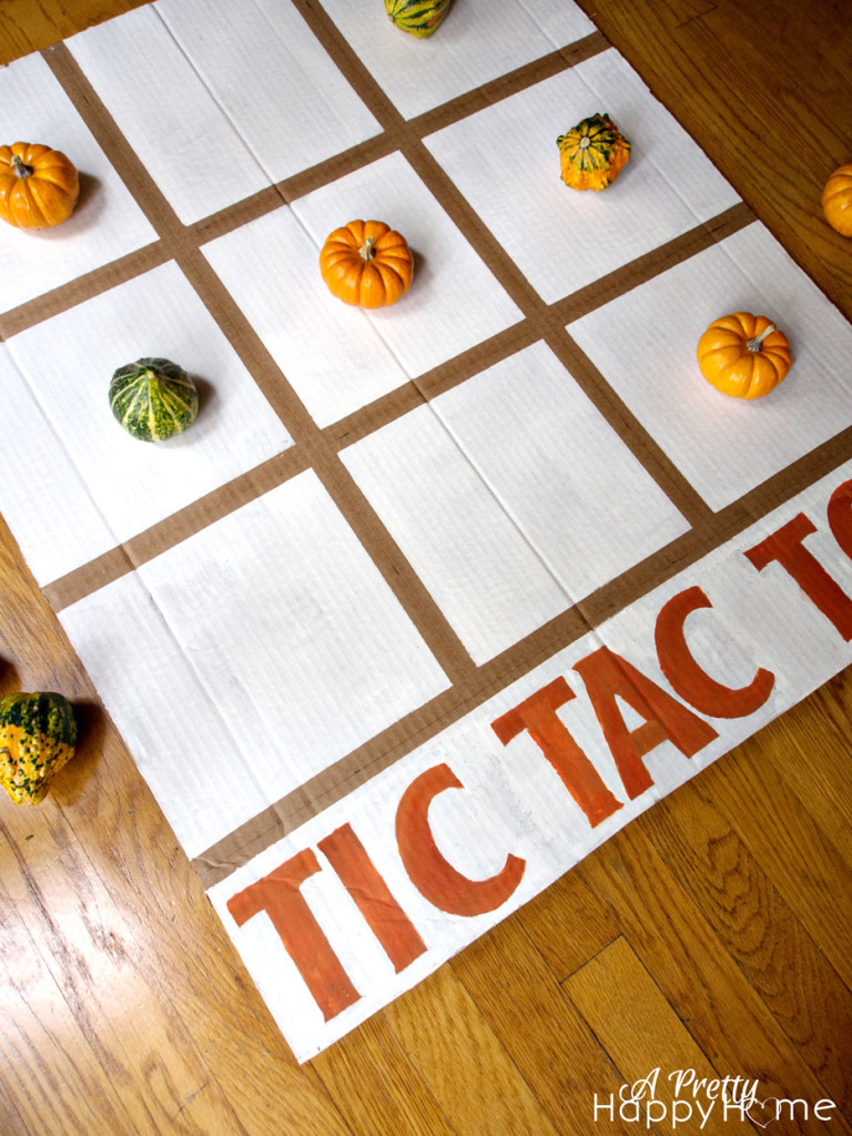 13 diy fall decor ideas giant tic tac toe from up cycled amazon box and mini pumpkins as playing pieces