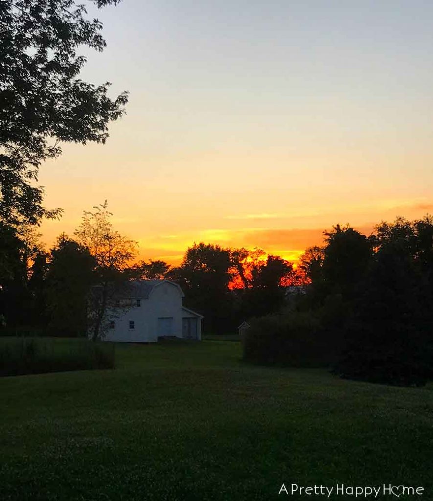 barn at sunset breaking in our colonial farmhouse