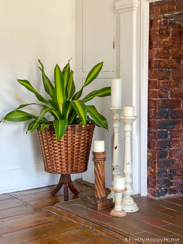 woven basket plant stand farmhouse fireplace