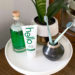 use a cake stand to corral bathroom counter clutter