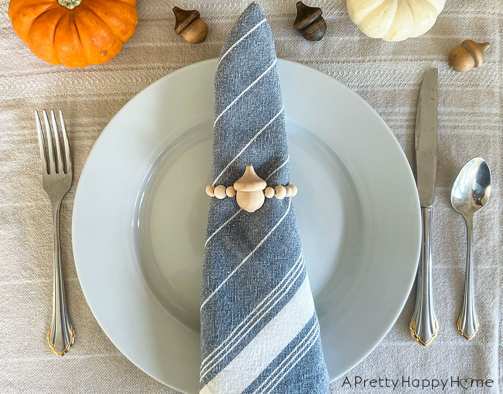 DIY Wood Acorn Napkin Rings how to make wood bead and acorn napkin rings fall napkin rings thanksgiving napkin rings