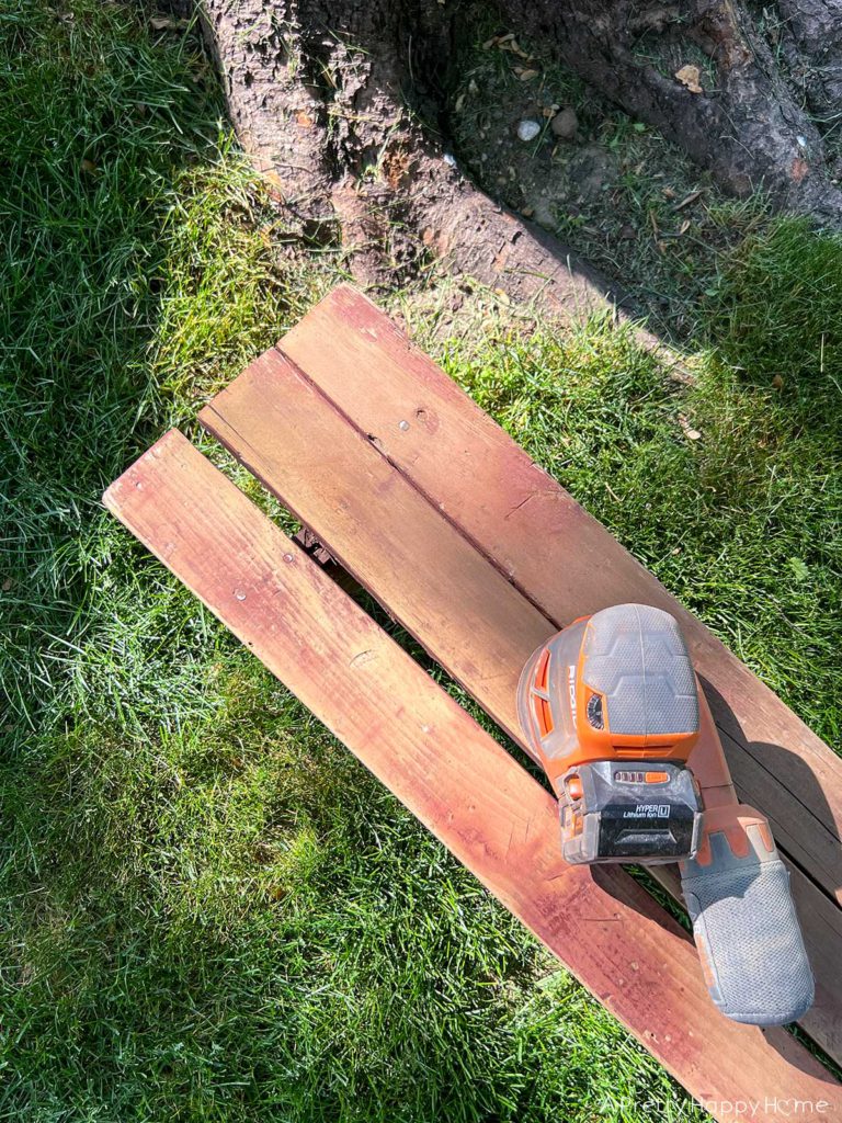 Before photo of a Petite Bench For An Outdoor Coffee Table use a bench from a kid sized picnic table as an outdoor coffee table 