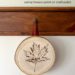 how to leaf stamp on wood using house paint or craft paint fresh leaves and a wood round