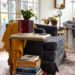 stack of books in a traditional living room with stained glass doors
