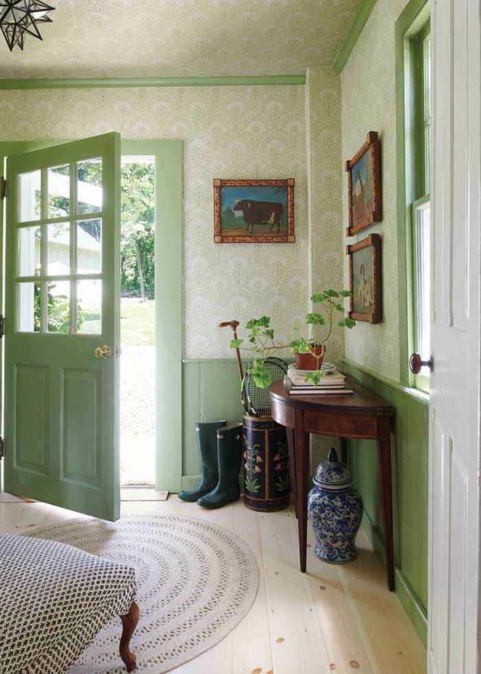 entry with green door and wainscoting home of susan crater of sister parish design photo by max kim-bee for frederic magazine on the happy list