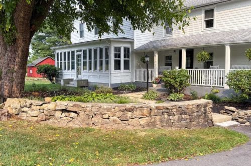 BEFORE DIY low curved fieldstone wall