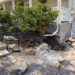 diy curved fieldstone wall demoing the old wall on a colonial era farmhouse