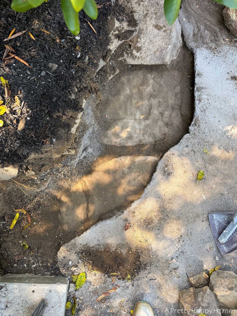 diy curved fieldstone wall demoing the old wall on a colonial era farmhouse