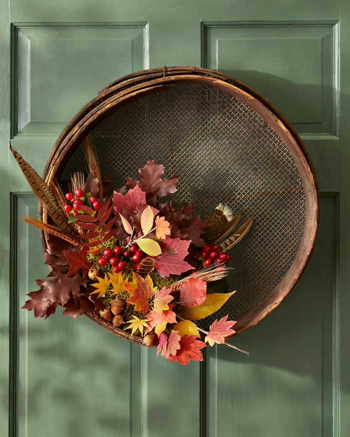 grain sifter fall wreath with feathers featured on country living photo by becky luigart stayner on the happy list
