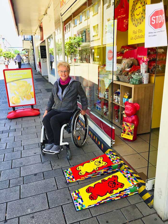 lego oma rita ebel legp ramp outside a sweets shop in germany via ability magazine on the happy list