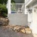exposing a stone foundation wall and repointing it with lime mortar