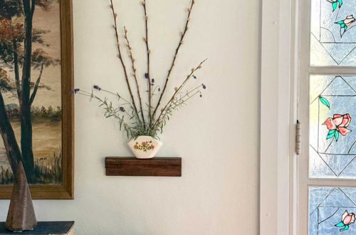 vintage wall pocket as part of a gallery wall how to style a wall pocket how to style a wall vase