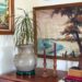 pared down gallery wall gallery wall with a wall pocket wall vase and nature paintings