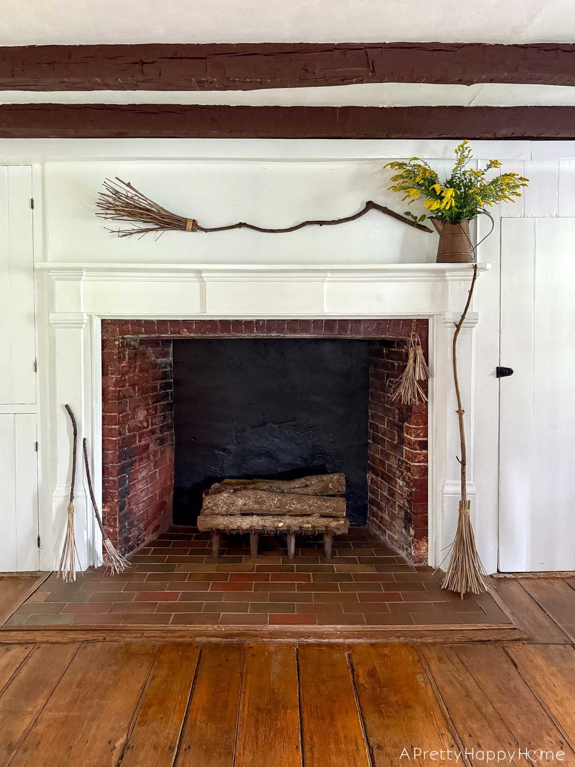 witchy halloween mantel mantel decorated with witch brooms