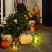 fall front porch with colored solar lanterns