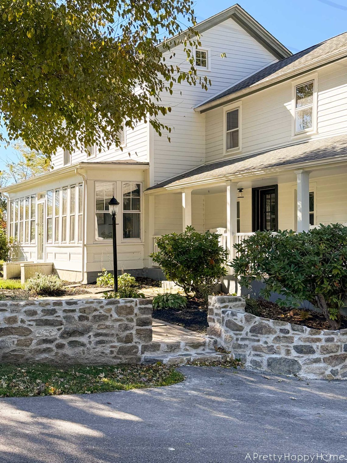 DIY curved fieldstone wall using historic masonry techniques and all fieldstone and lime mortar