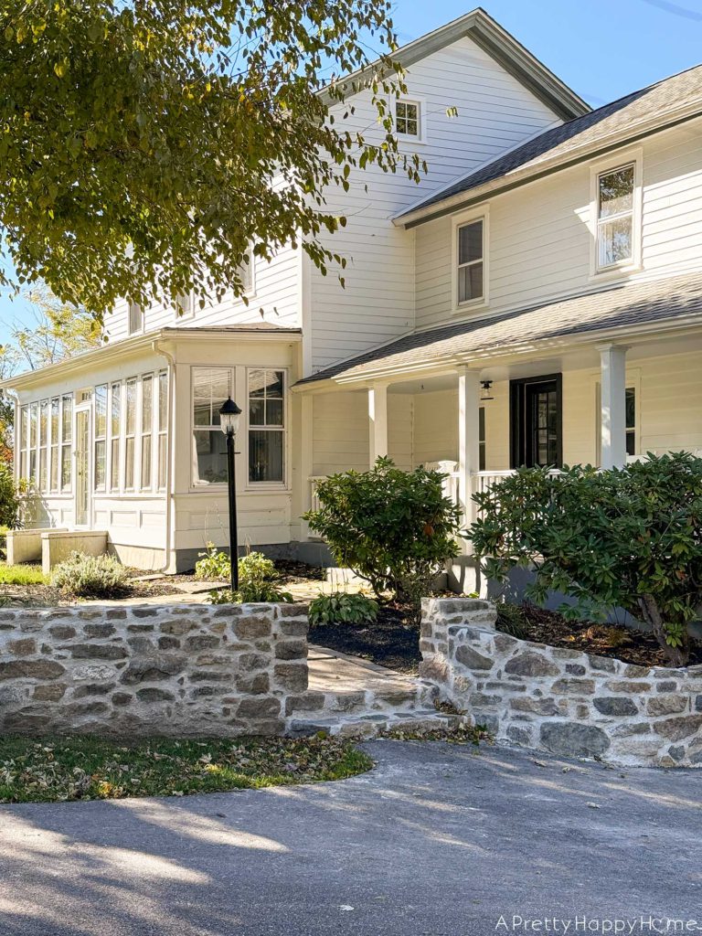 DIY curved fieldstone wall using historic masonry techniques and all fieldstone and lime mortar