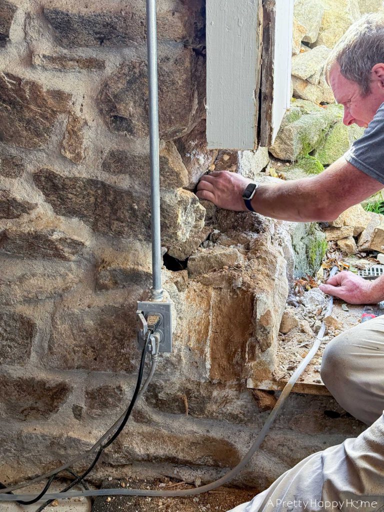 Converting a Door Into a Window In a Stone Building inside of a stone foundation in a 250 year old building