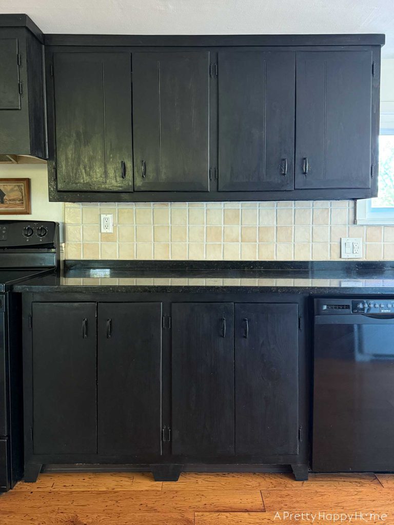 mini kitchen makeover five years later how it held up farmhouse kitchen with stained black cabinets