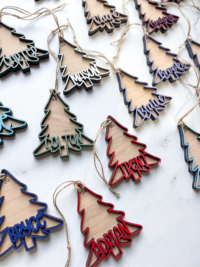 personalized name ornaments on a christmas tree from etsy shop blueflamedecor beautiful christmas ornaments 