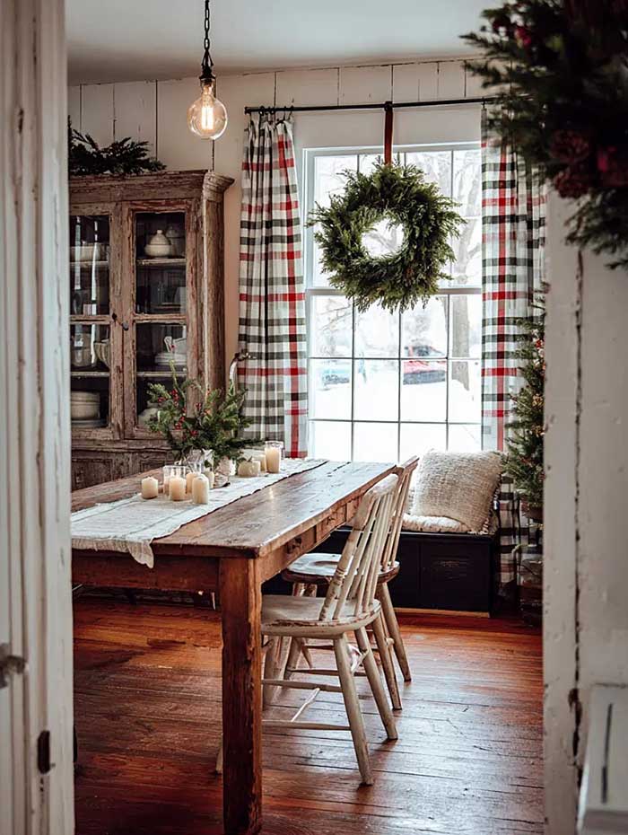 christmas vignette with plaid curtains and wreath in window via town n country living on the happy list