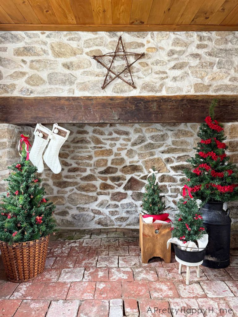 rustic carriage house christmas rustic stone fireplace decorated for christmas