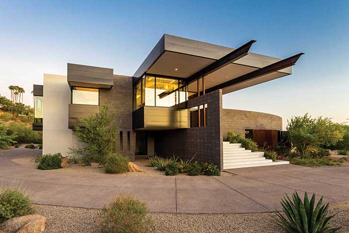 modern home in arizona designed by architect brent kendle that is an upside down home meaning the living areas are on the second floor to take advantage of the view. Shown in phoenix home and garden magazine.