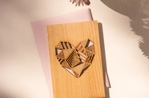 laser engraved wood greeting card with heart cutout by etsy shop HereAfterLA