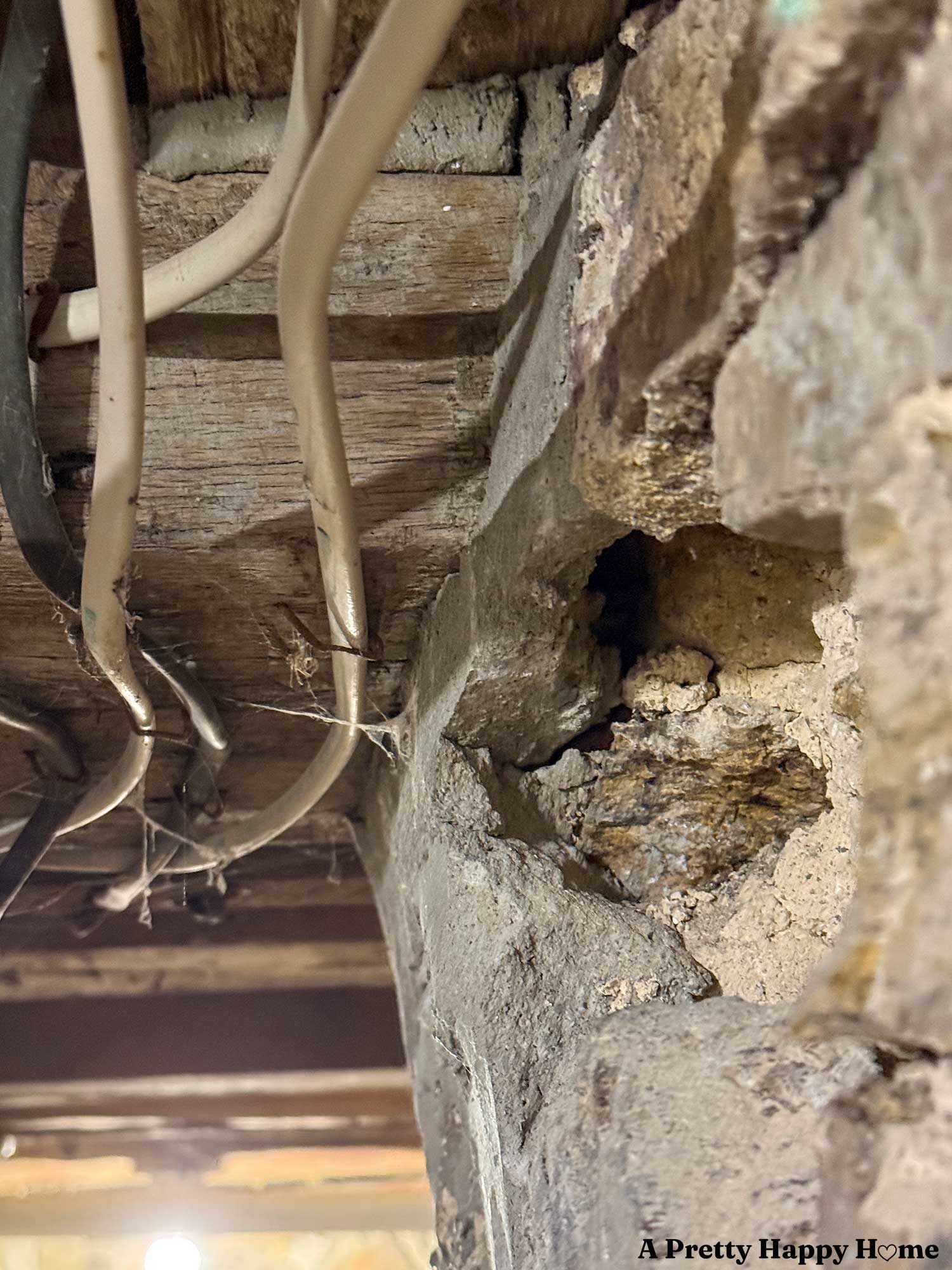 doorway header on a stone foundation that is sitting on concrete and not the stone wall. if the concrete fails, so do the door headers