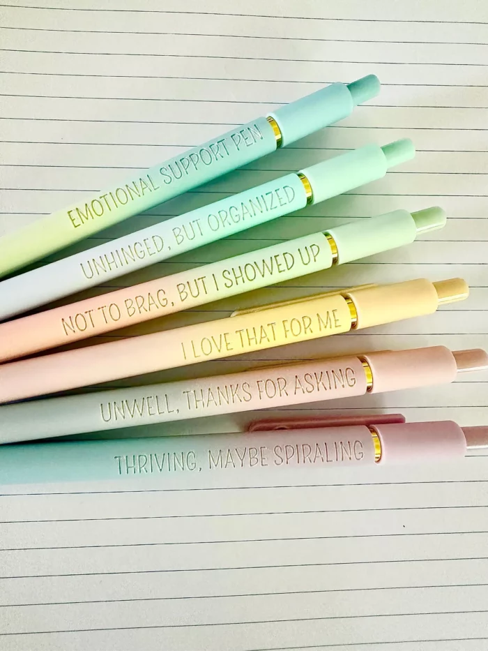 gel pen set in soft rainbow colors that have sarcastic sayings on them