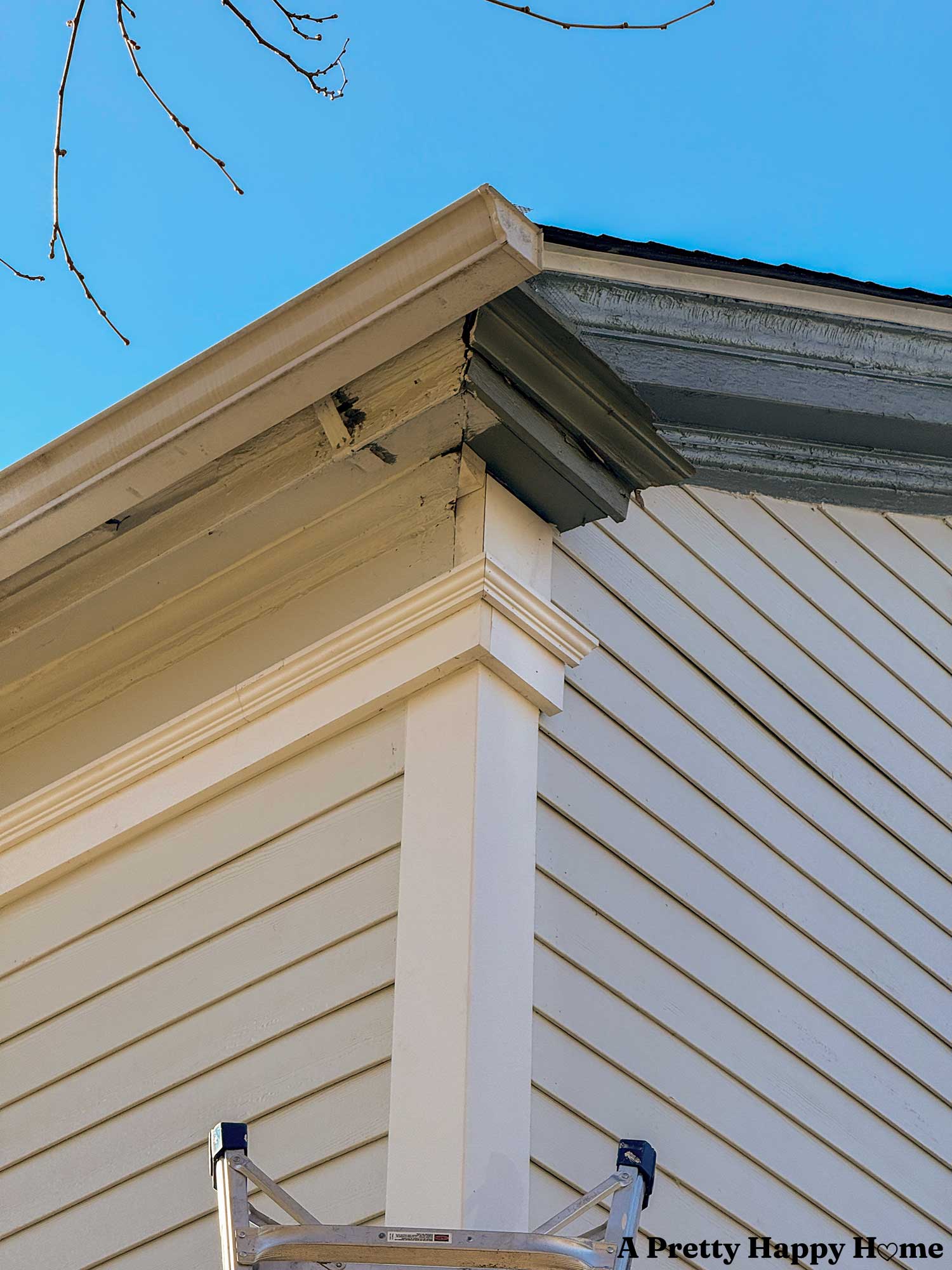 Close up view of a rotting gable return on a greek revival style home