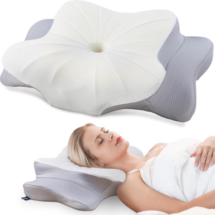woman with blonde hair sleeping on a cervical neck pillow