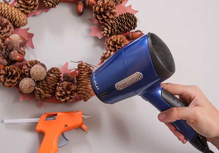 eliminate hot glue strands with a hair dryer