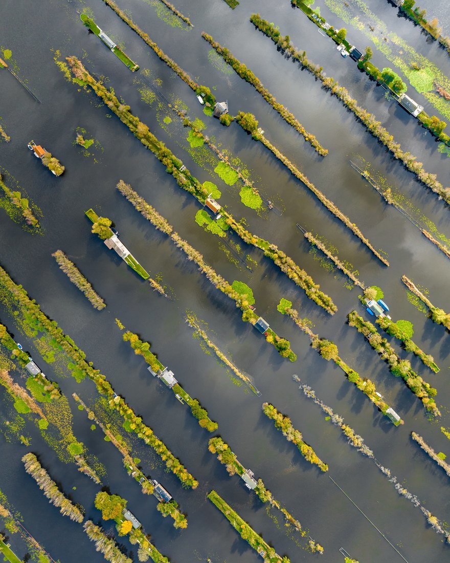 aerial view of the dutch town of Loosdrecht where the residents live on tiny strips of land in the middle of a lake