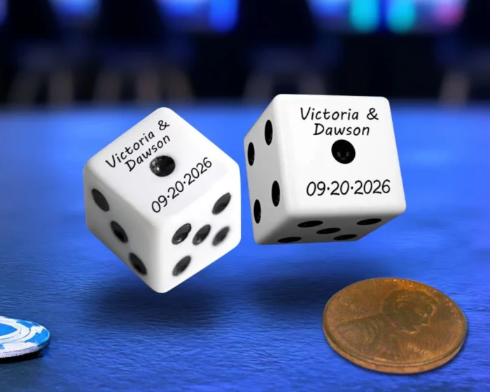 white dice on blue background personalized to say Victoria and Dawon September 20 2026 for a wedding favor