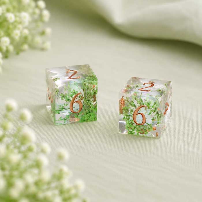 set of two D6 mahjong dice in a green acrylic botanical pattern