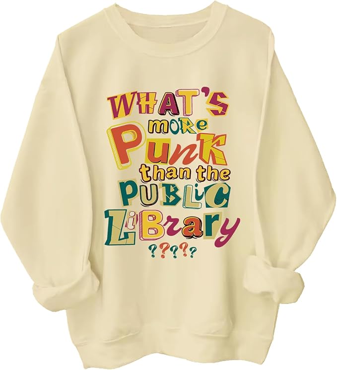 cream colored sweatshirt that reads what's more punk than the public library